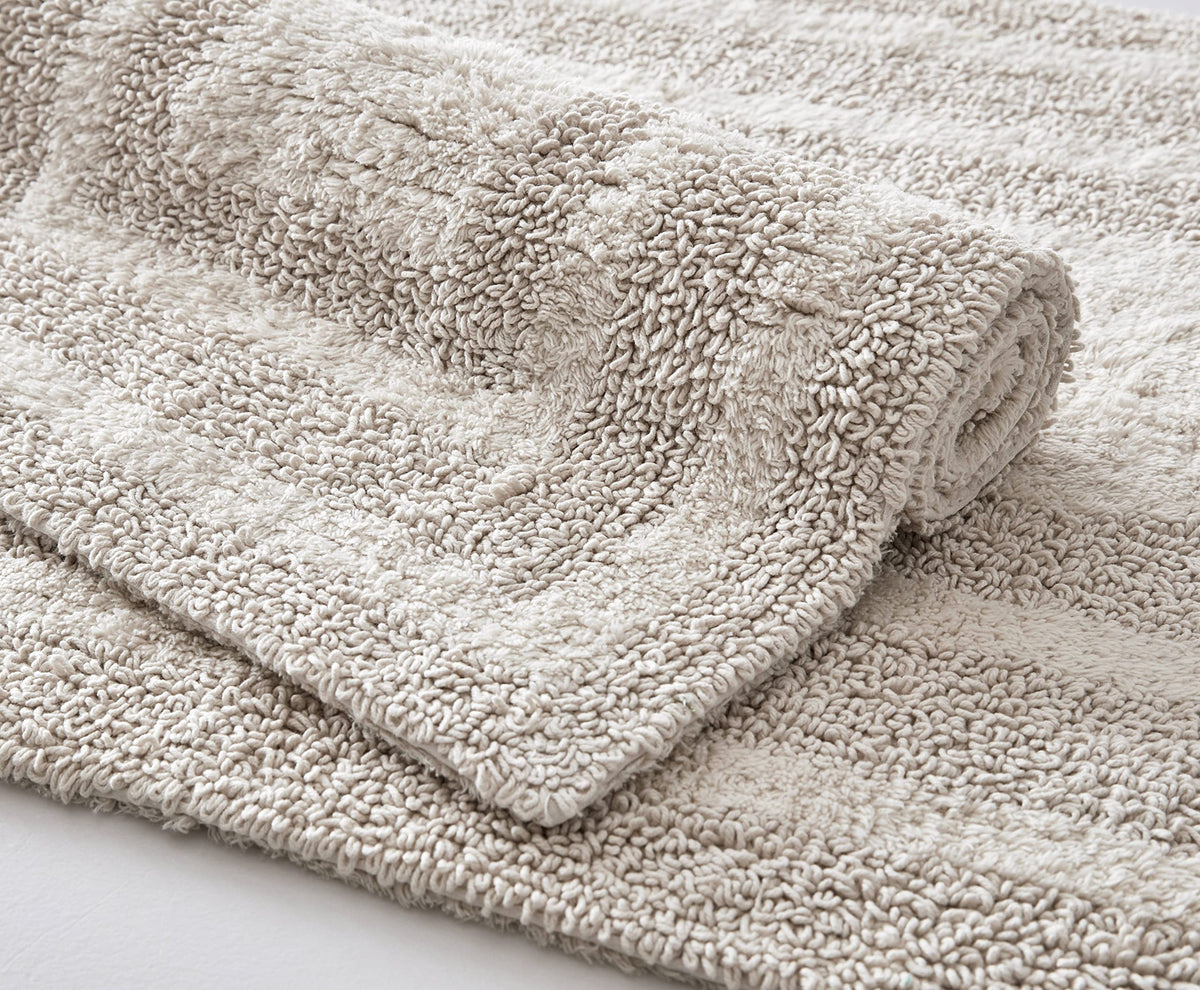 Eddie Bauer Logan 60-inch rug fits standard bathrooms for easy placement.