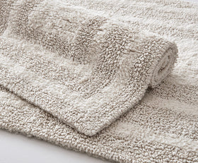 Eddie Bauer Logan 60-inch rug fits standard bathrooms for easy placement.