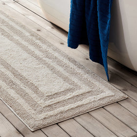 Eddie Bauer Logan bath rug non-skid backing detail helps prevent slipping on wet floors.
