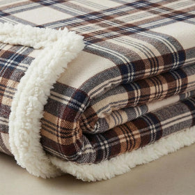 Eddie Bauer reversible sherpa fleece blanket with plush side visible for year-round comfort