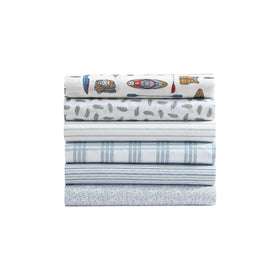 Eddie Bauer percale bedding on a tidy bed suggests cool, inviting nights.