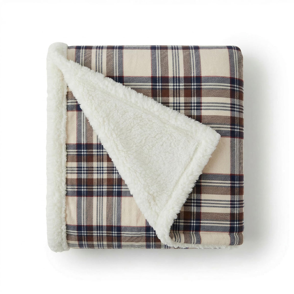 Eddie Bauer Sherpa throw blanket on a couch showing ultra-soft fleece and plush sherpa warmth