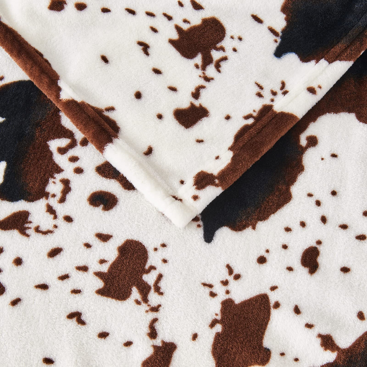 Edenleaf cow print blanket gift-ready packaging for loved ones.