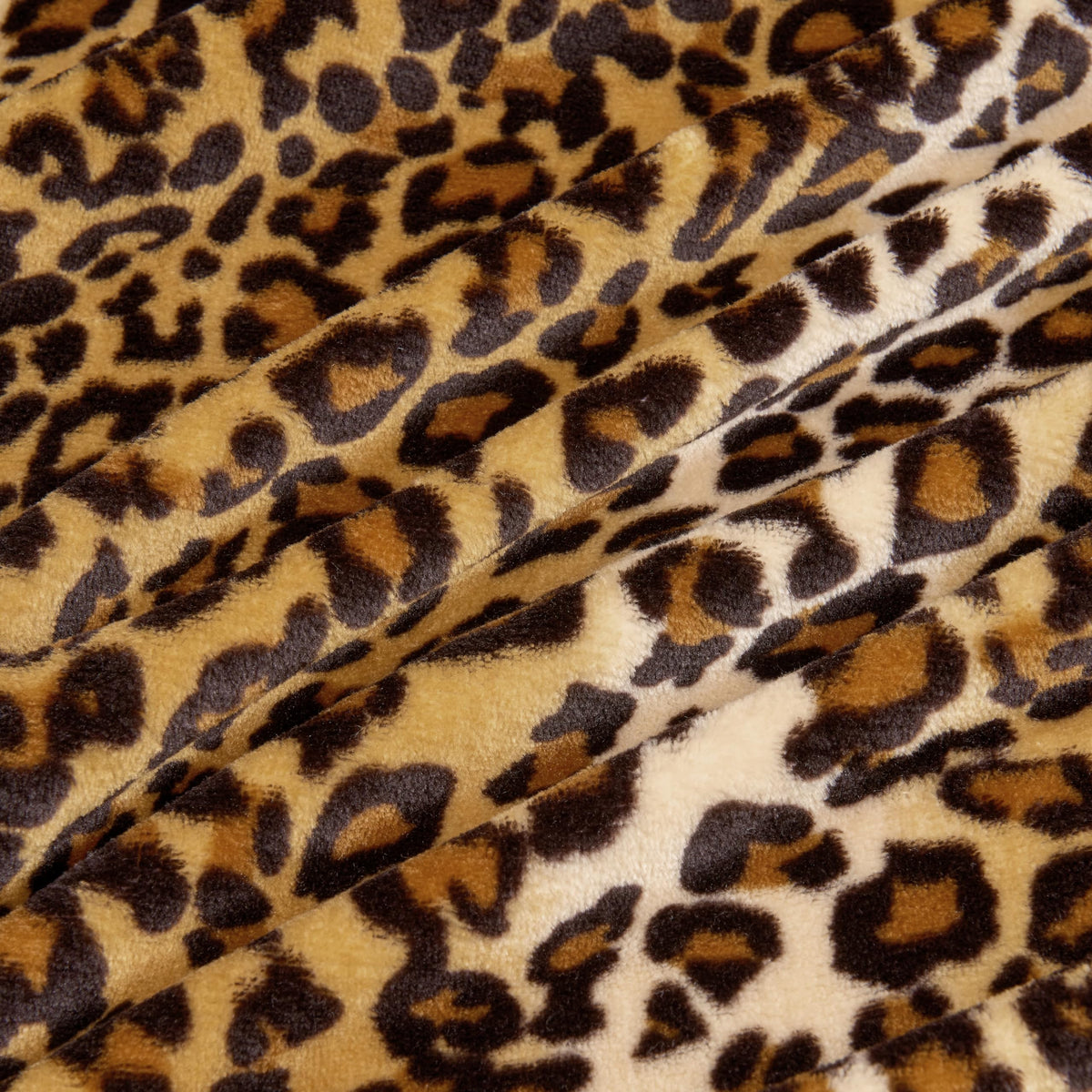 Edenleaf leopard blanket detailed stitching for durable wear.