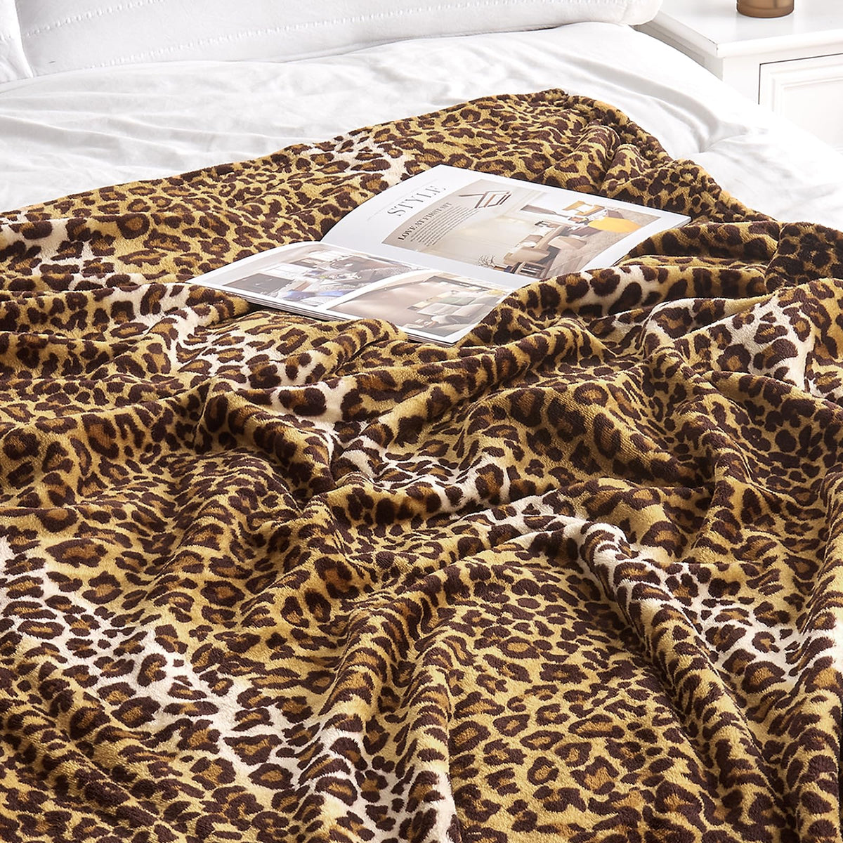 Edenleaf leopard blanket folded as a thoughtful cozy gift.