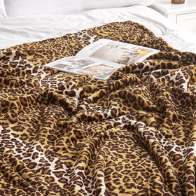Edenleaf leopard blanket folded as a thoughtful cozy gift.