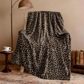 Edenleaf leopard blanket on bed for a cozy bedroom accent