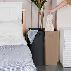 efluky Slim Laundry Basket with drawstring cover blocks dust on clothes.