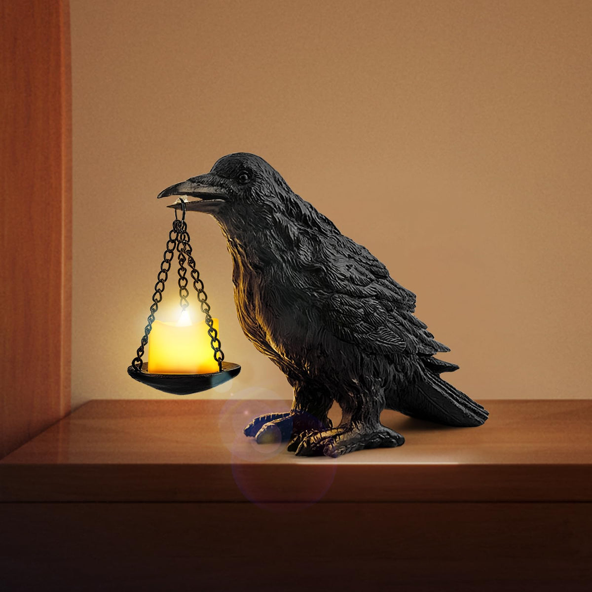Ehuoyan Crow Lamp with tealight holder showcasing lifelike raven feathers for ambient glow.
