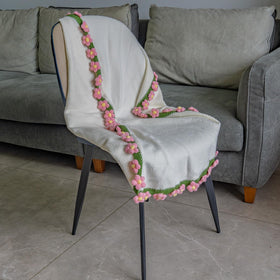 EIGHTOWN floral art unfolds into a lightweight throw for year-round comfort
