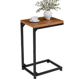 Ekisemio C Table for Sofa shown beside a couch, ideal for snacks or laptop use.