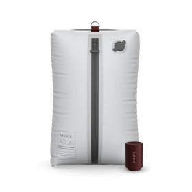 Ekster Travel Pack Vacuum Bags with pump demonstrate space-saving capacity for packed travel outfits.