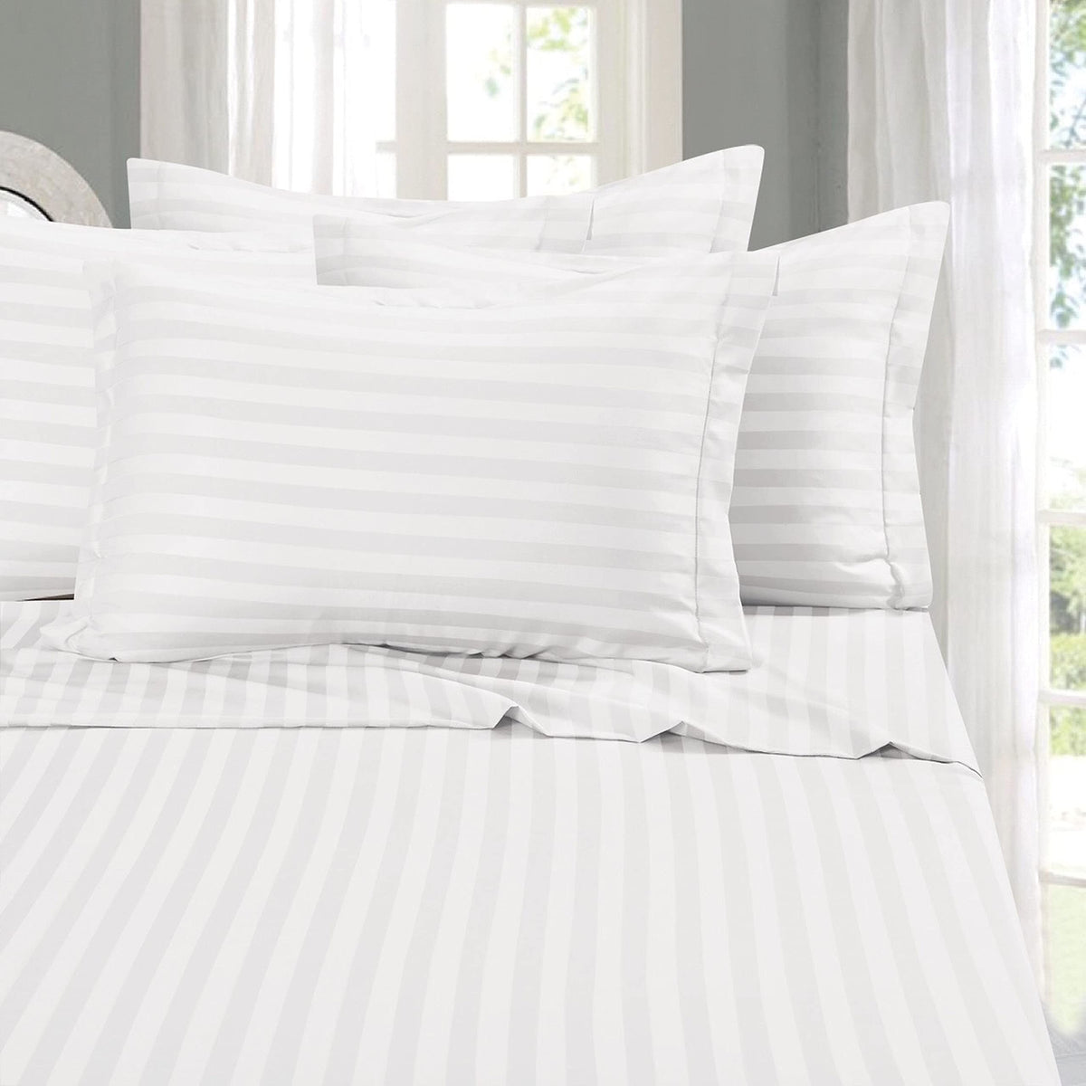 Elegant Comfort flat sheet close-up shows silky softness for luxurious sleep
