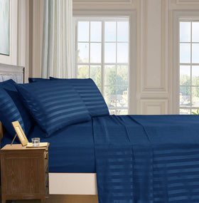 Elegant Comfort queen-size sheet set on bed showcasing plush softness