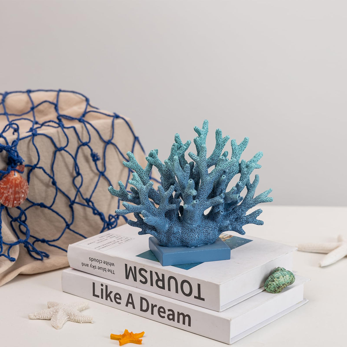 Elegondrar blue coral reef shelf decor blends with nautical interiors.