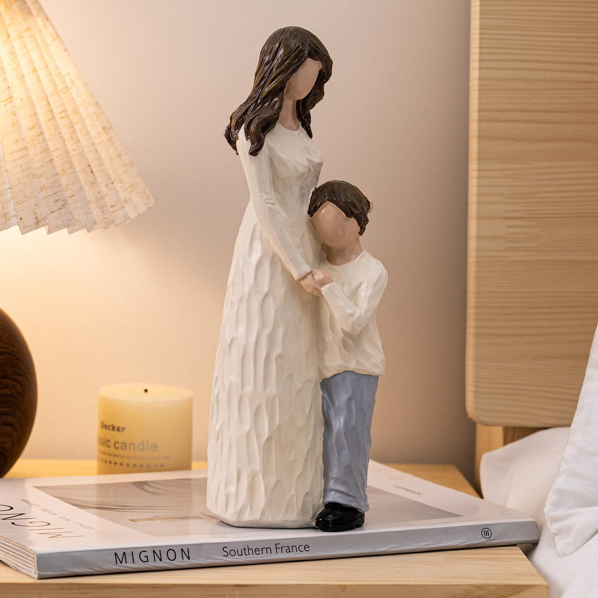 Hand-painted resin sculpture highlights expressive details for heartfelt home decor.