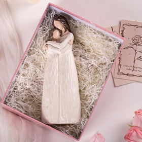 Elegondrar love and family sculpture conveys warmth without words