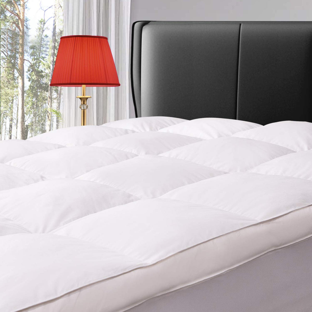 ELEMUSE king-size topper close-up of down layer showing plush loft and breathability.