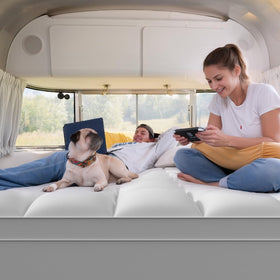 Elemuse RV topper on bed presents a plush, inviting sleeping surface.