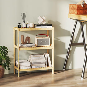 Elepude Bamboo Shelf plant stand with decorative greenery.