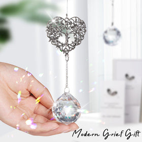 Elivida clear crystal ball prism creates rainbow reflections when sunlight hits