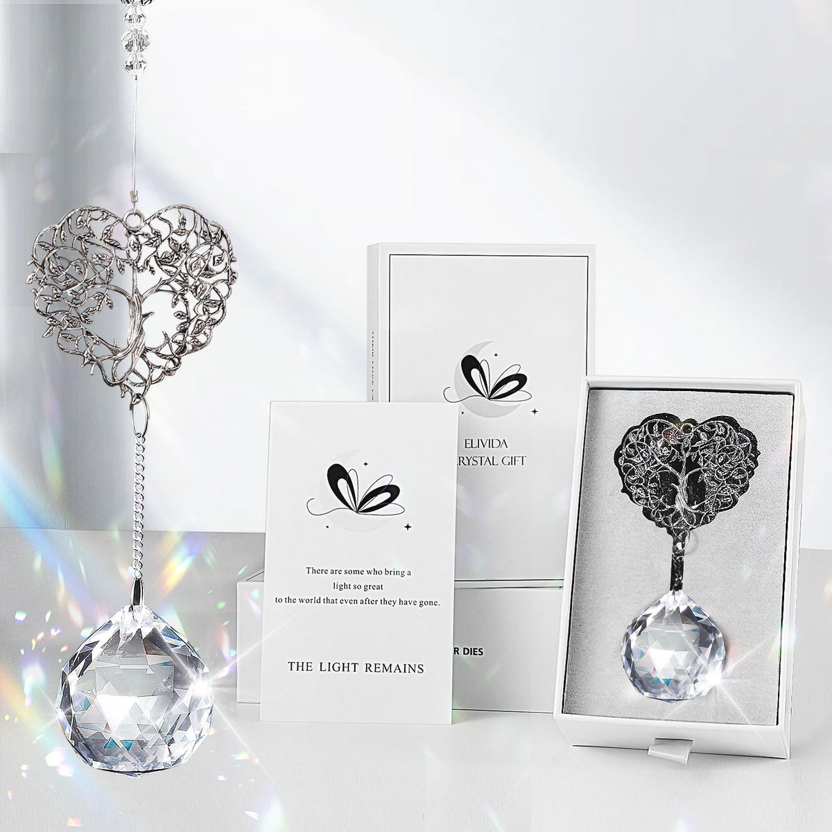 Elivida tree of life heart ornament with a 40 mm crystal ball casting rainbow light