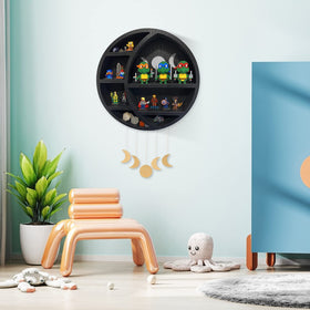 Black round shelf blending modern and celestial styles in any room.