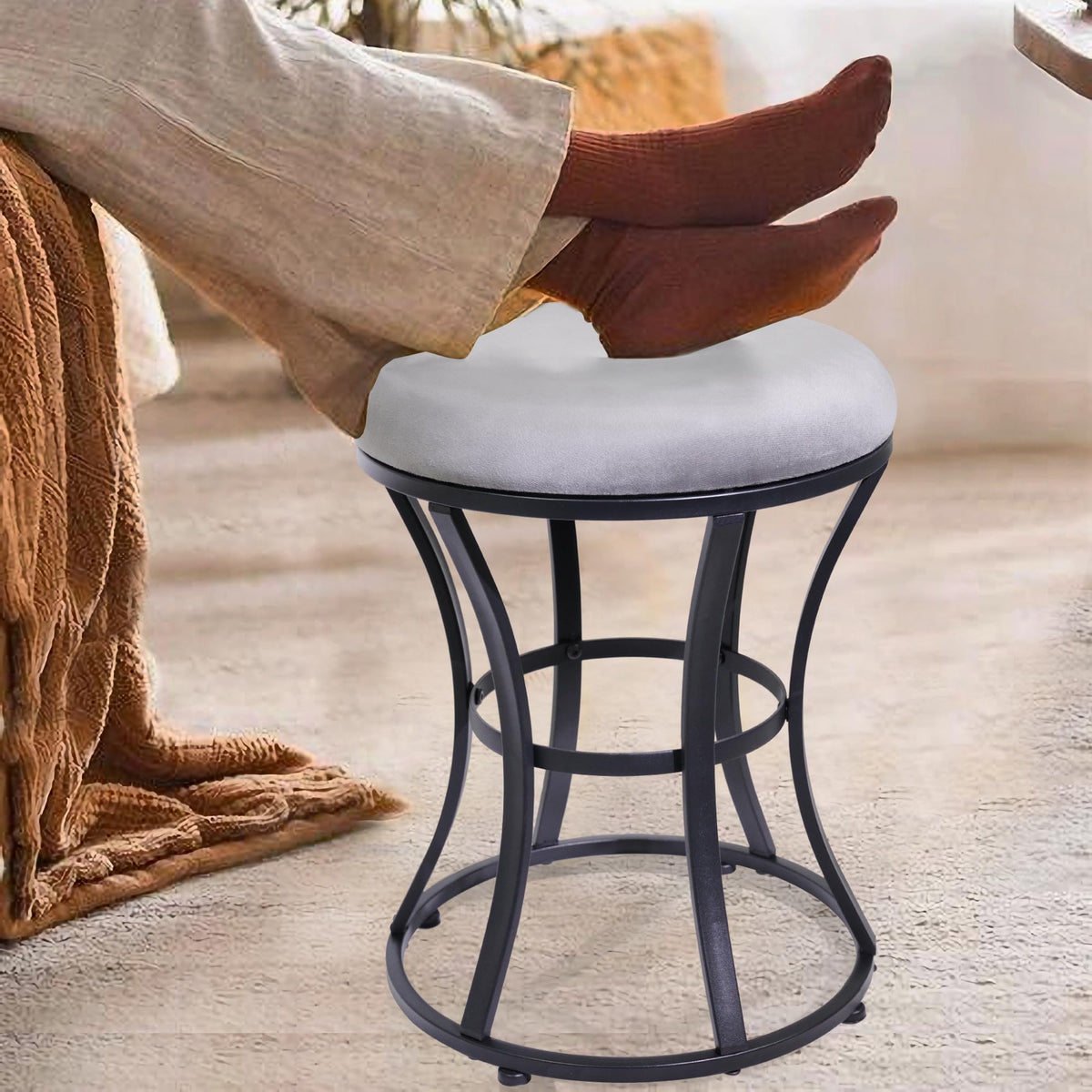 Living room setup using Ellensamqi stool as extra seating and footrest.