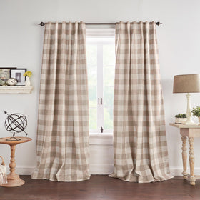 Elrene Grainger buffalo-check blackout panel on a window reduces light for restful sleep