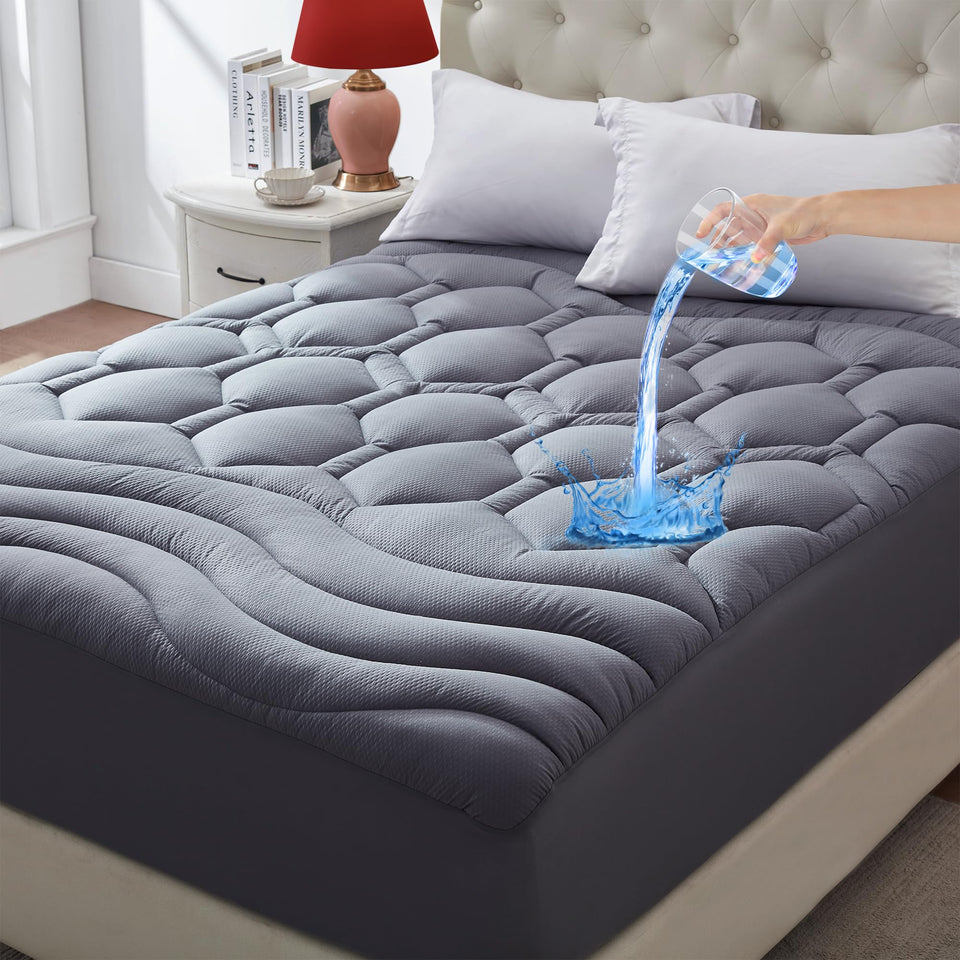 Elven Home king size waterproof mattress pad protects against spills and stains.