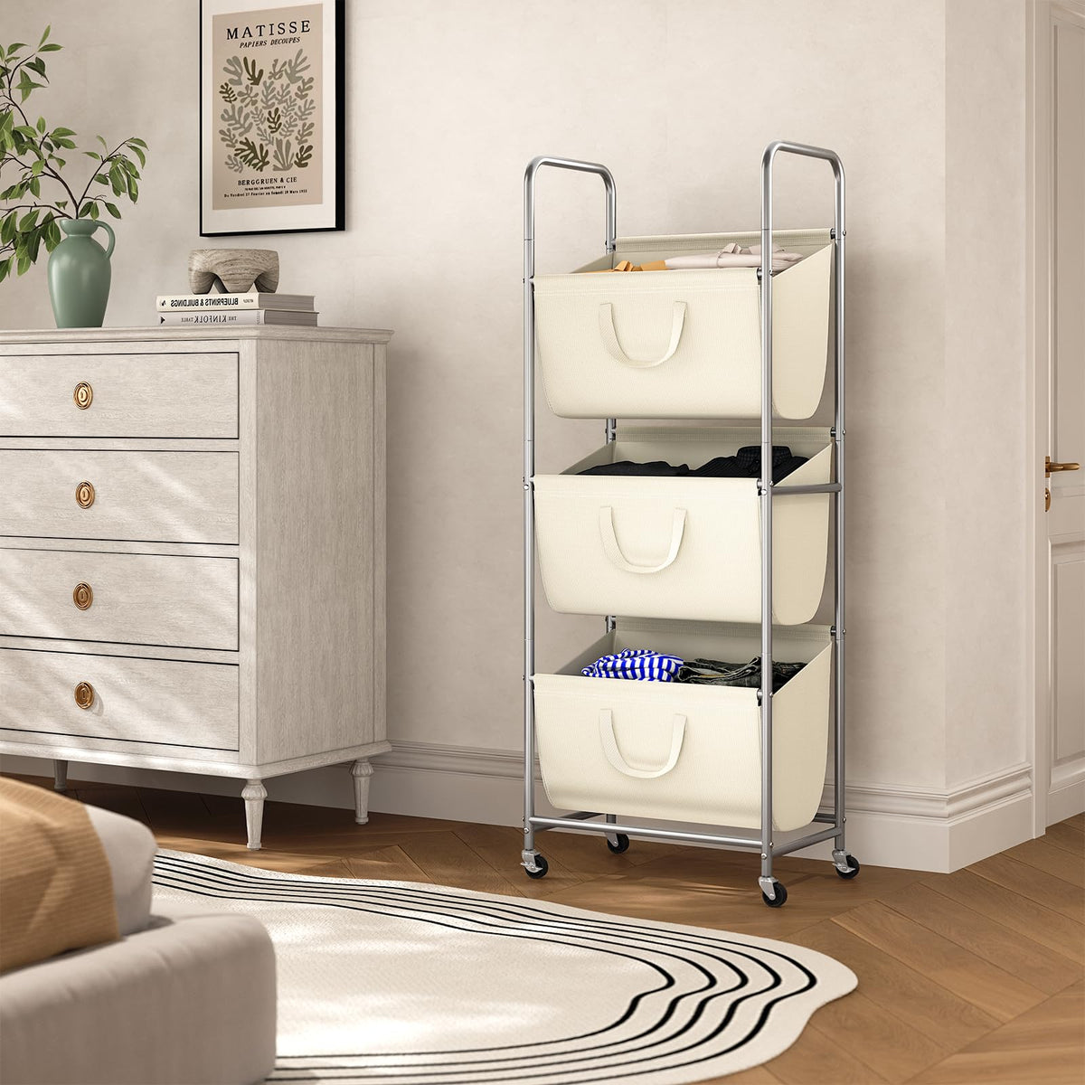 ELYKEN 3-section sorter with removable bags demonstrating easy pre-sorting of lights, darks, and delicates.