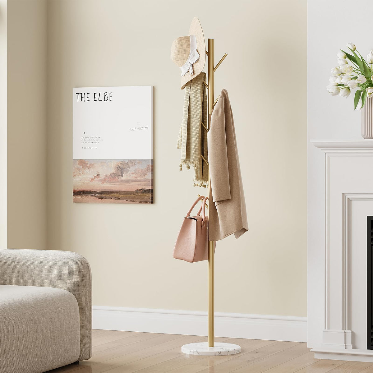 ELYKEN gold-finish coat rack adds a modern, luxe touch.