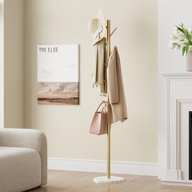 ELYKEN gold-finish coat rack adds a modern, luxe touch.