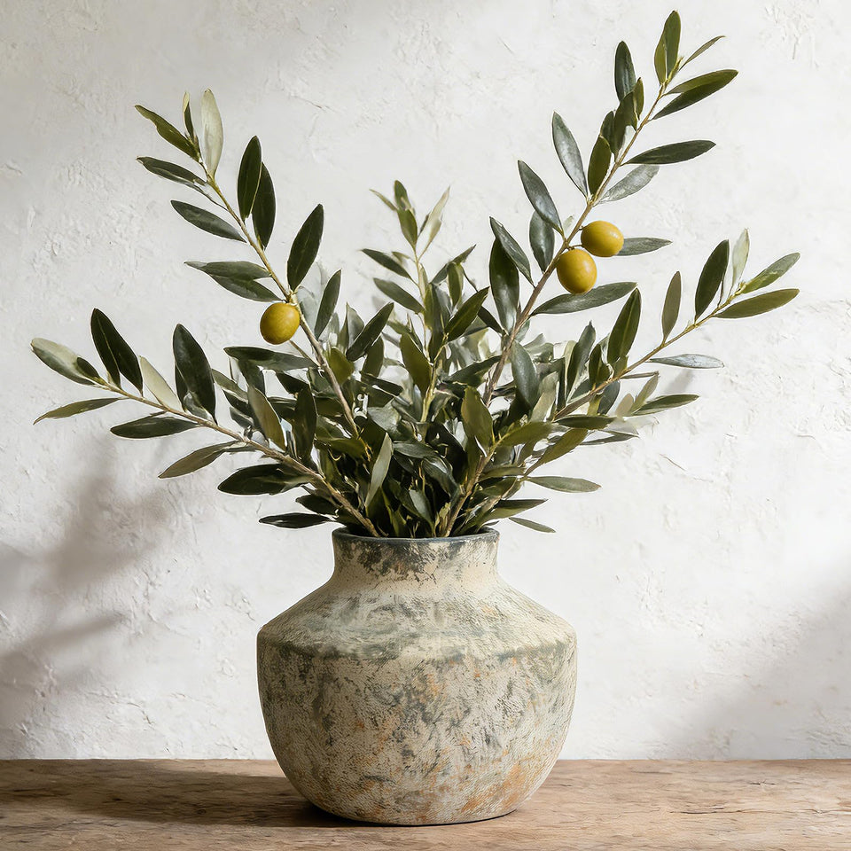 ELYSSIRENA ceramic vase with weathered finish for rustic living room centerpieces.