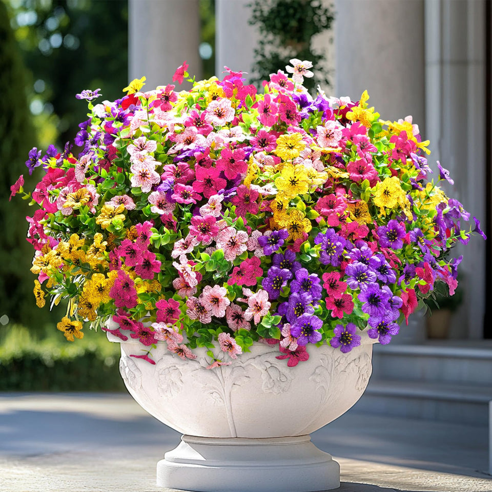 Elyum artificial outdoor flowers in mixed colors add vibrant curb appeal for any space.