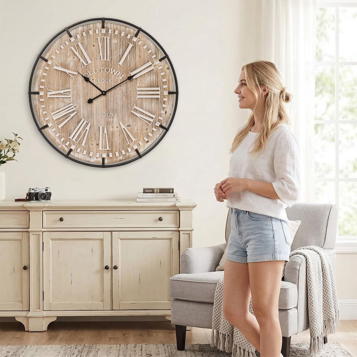 EMAX HOME oversized wall clock in living room makes a bold focal point.