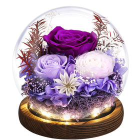 Emibele preserved rose in glass dome with warm LED light creates a romantic bedside glow.