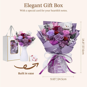 Emibele preserved rose bouquet with lush greens and textures for depth.