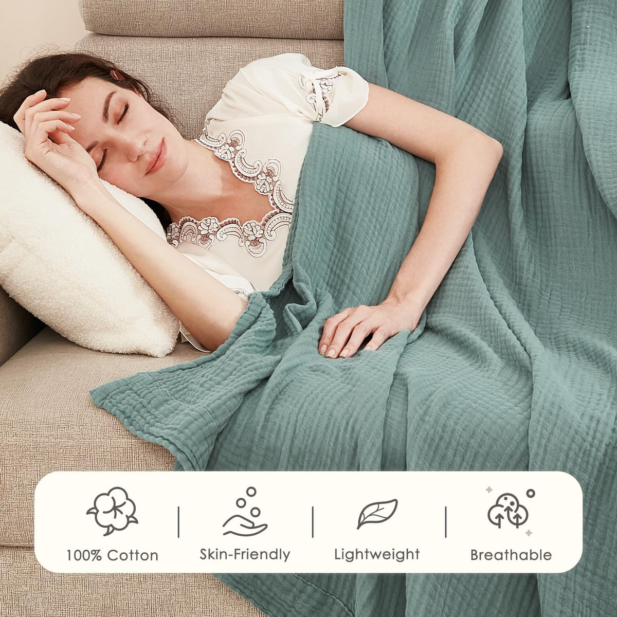 EMME blanket on bed demonstrates generous size for family sharing.