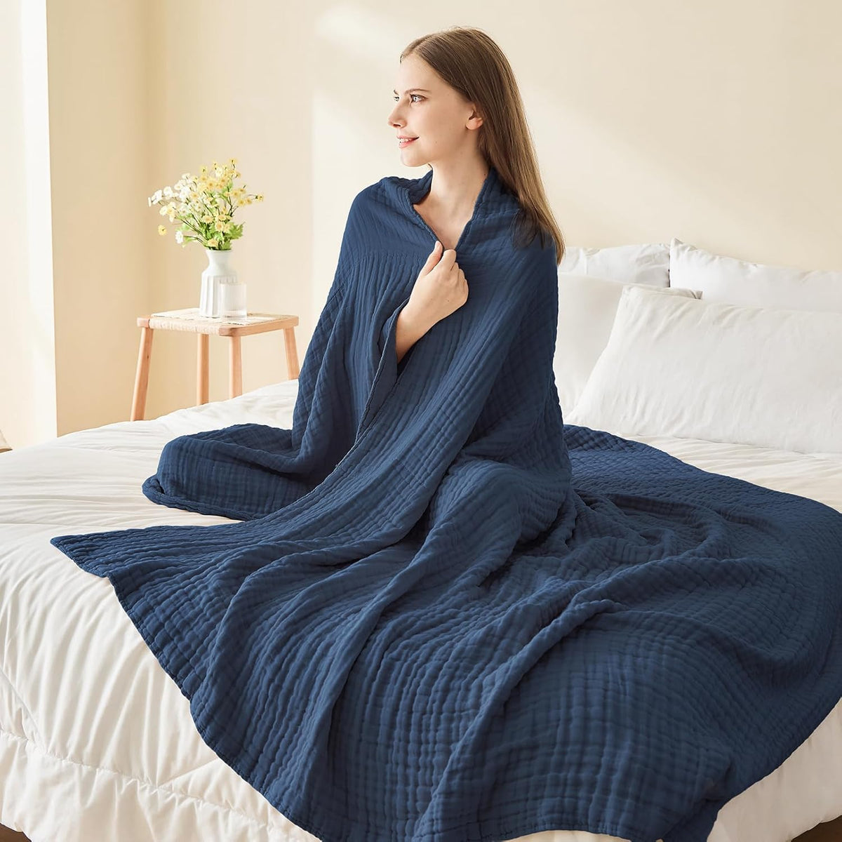 Gift-ready EMME blanket offers cozy comfort for birthdays or housewarmings.