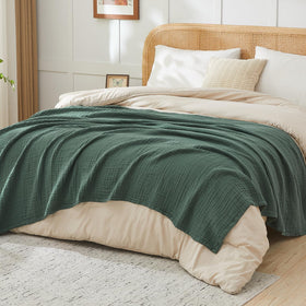EMME blanket as crib cover provides gentle warmth.