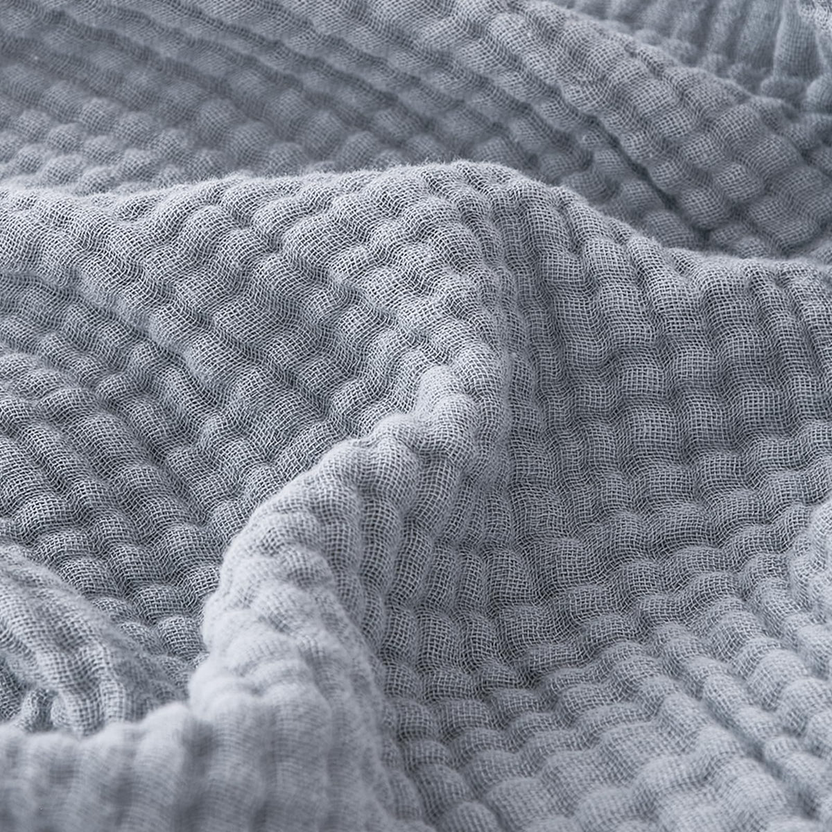 EMME cotton muslin blanket in dusty blue, lightweight and cozy for everyday use