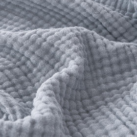 EMME cotton muslin blanket in dusty blue, lightweight and cozy for everyday use