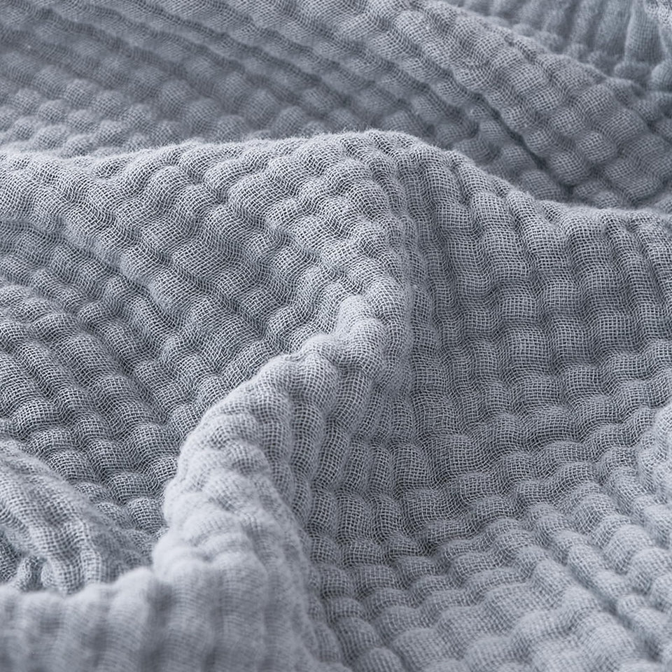 EMME cotton muslin blanket in dusty blue, lightweight and cozy for everyday use