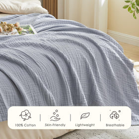 Travel-ready EMME muslin throw for trips and easy packing