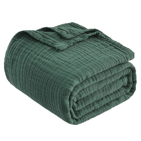 EMME forest green throw brightens living room decor.