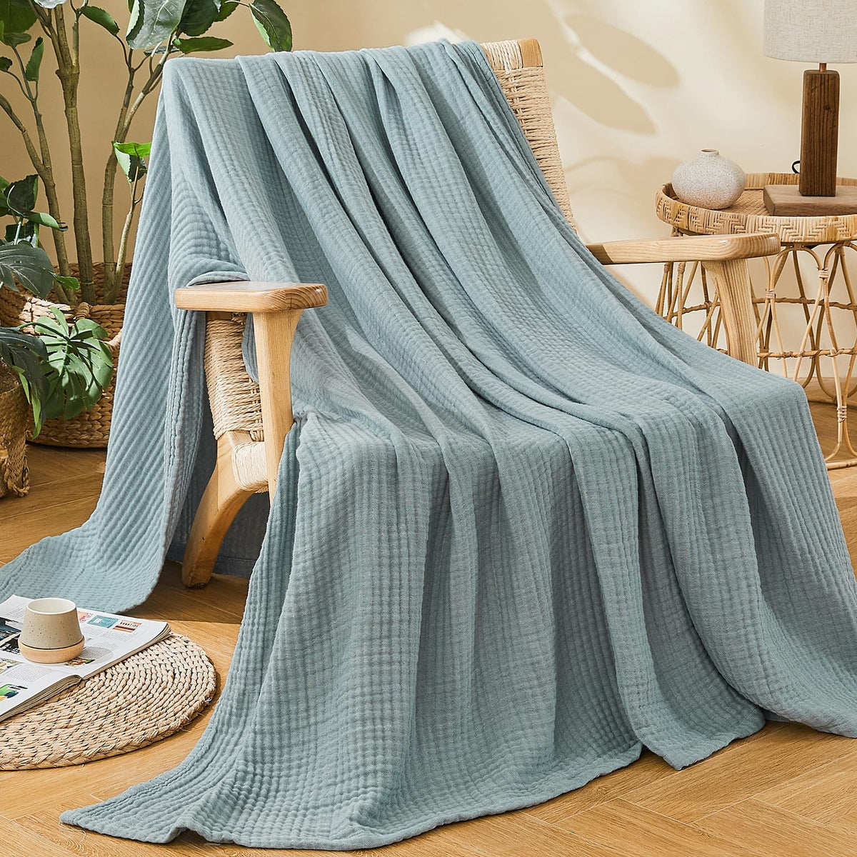 EMME blanket shows breathable weave for airy softness during warm nights.