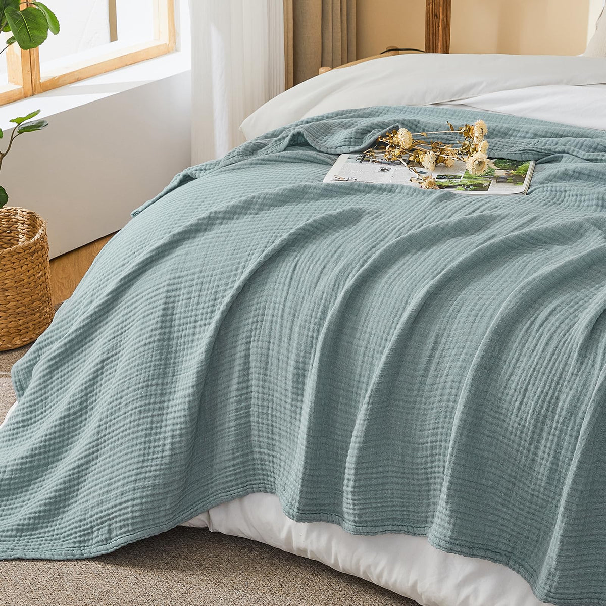 Nursery-ready crib coverage with EMME muslin blanket for gentle warmth.