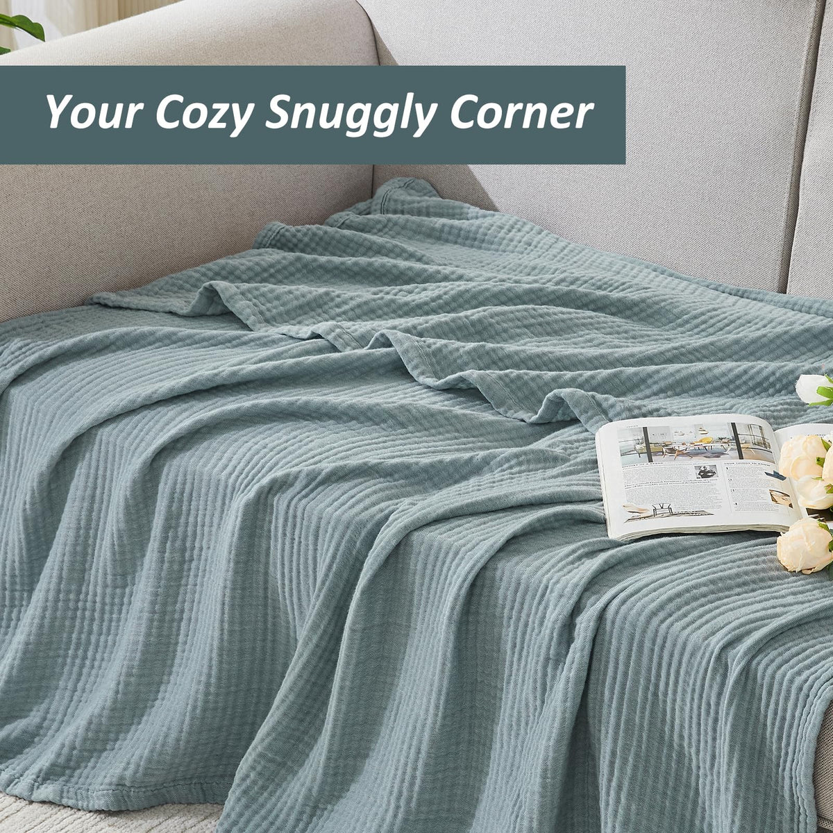 Travel-ready EMME throw blanket folded for easy packing on trips.