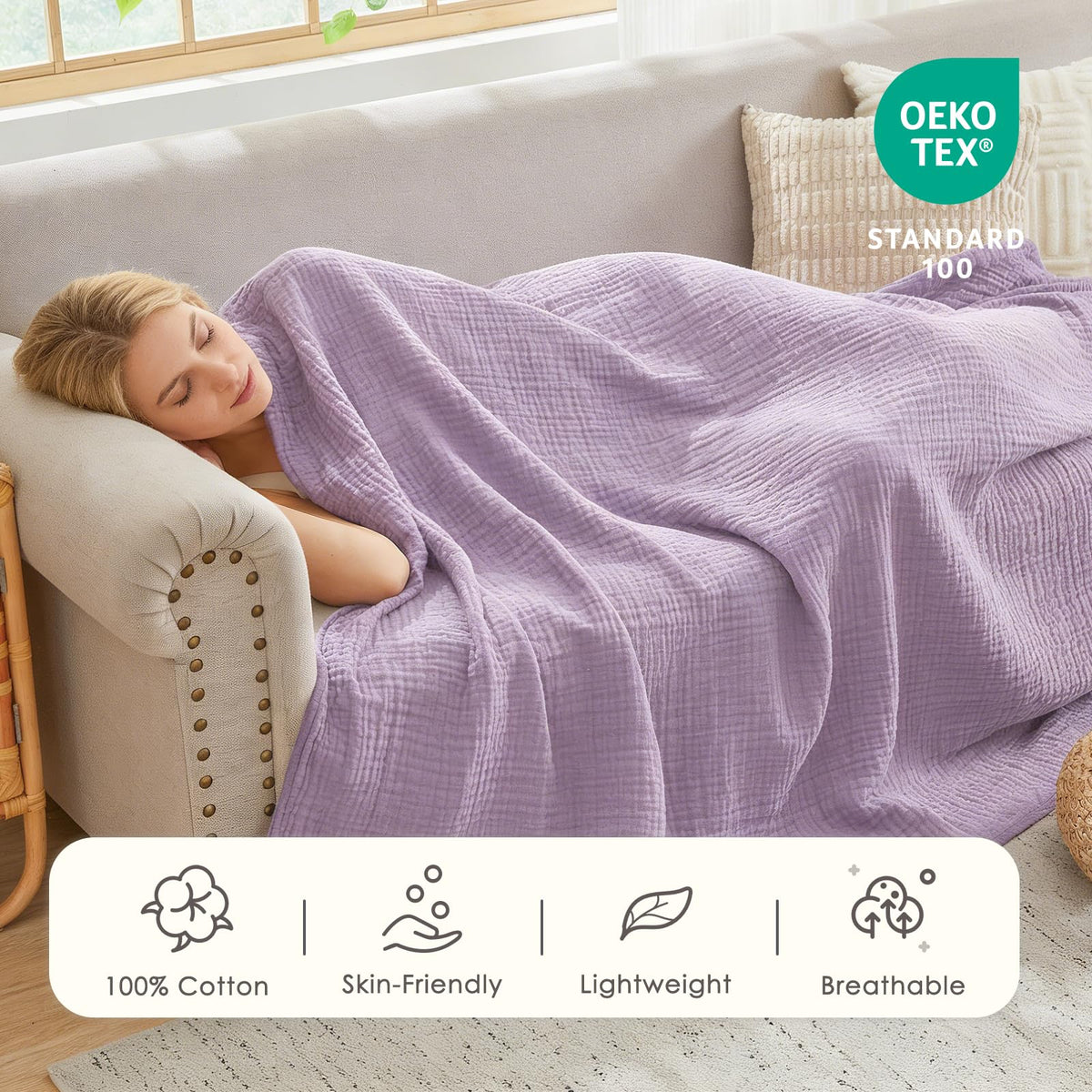 EMME bed blanket draped over bed for breathable, year-round warmth.